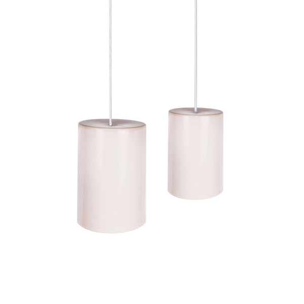Metal cylinder outlet pendant light
